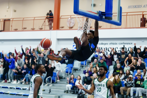 Men's Basketball Huskies charge ahead to defeat Kings on home court